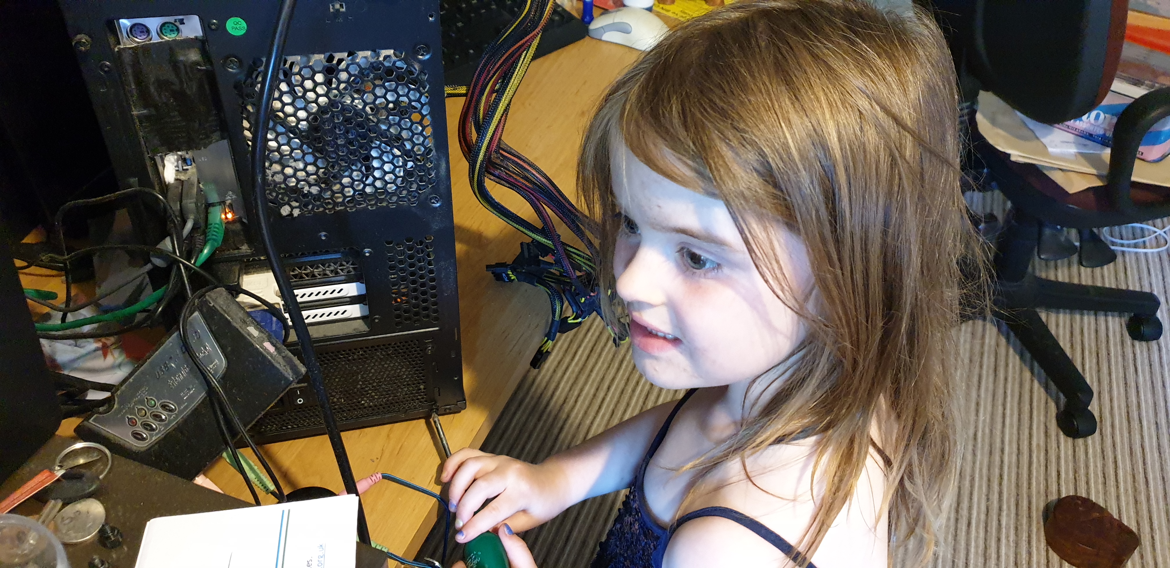 Annabel repairing her mother's computer.